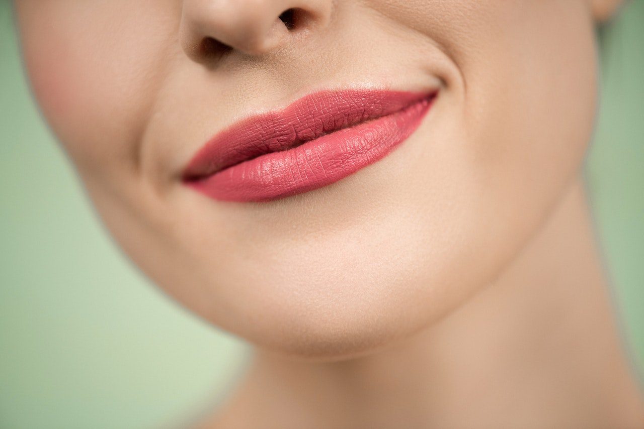 A close up of the lips and chin of a woman