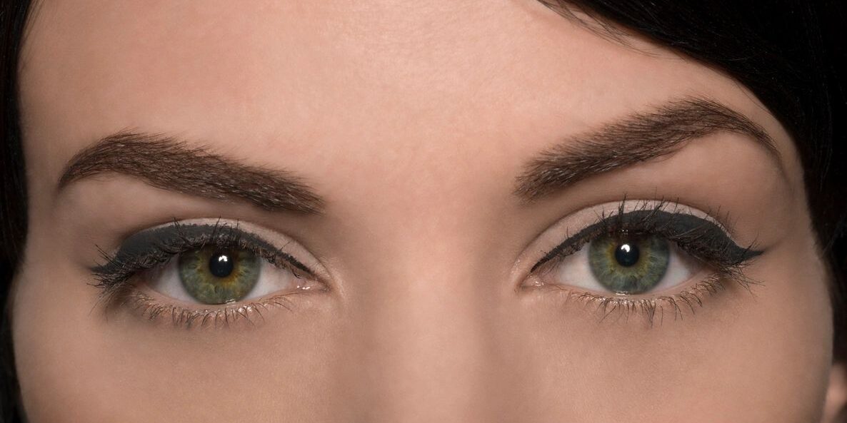 A close up of the eyes of a woman